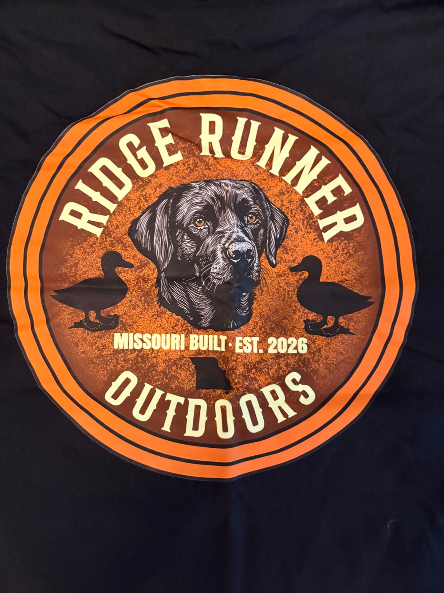 Ridge Runner Outdoors Missouri State Series graphic with a dog and ducks on a black background