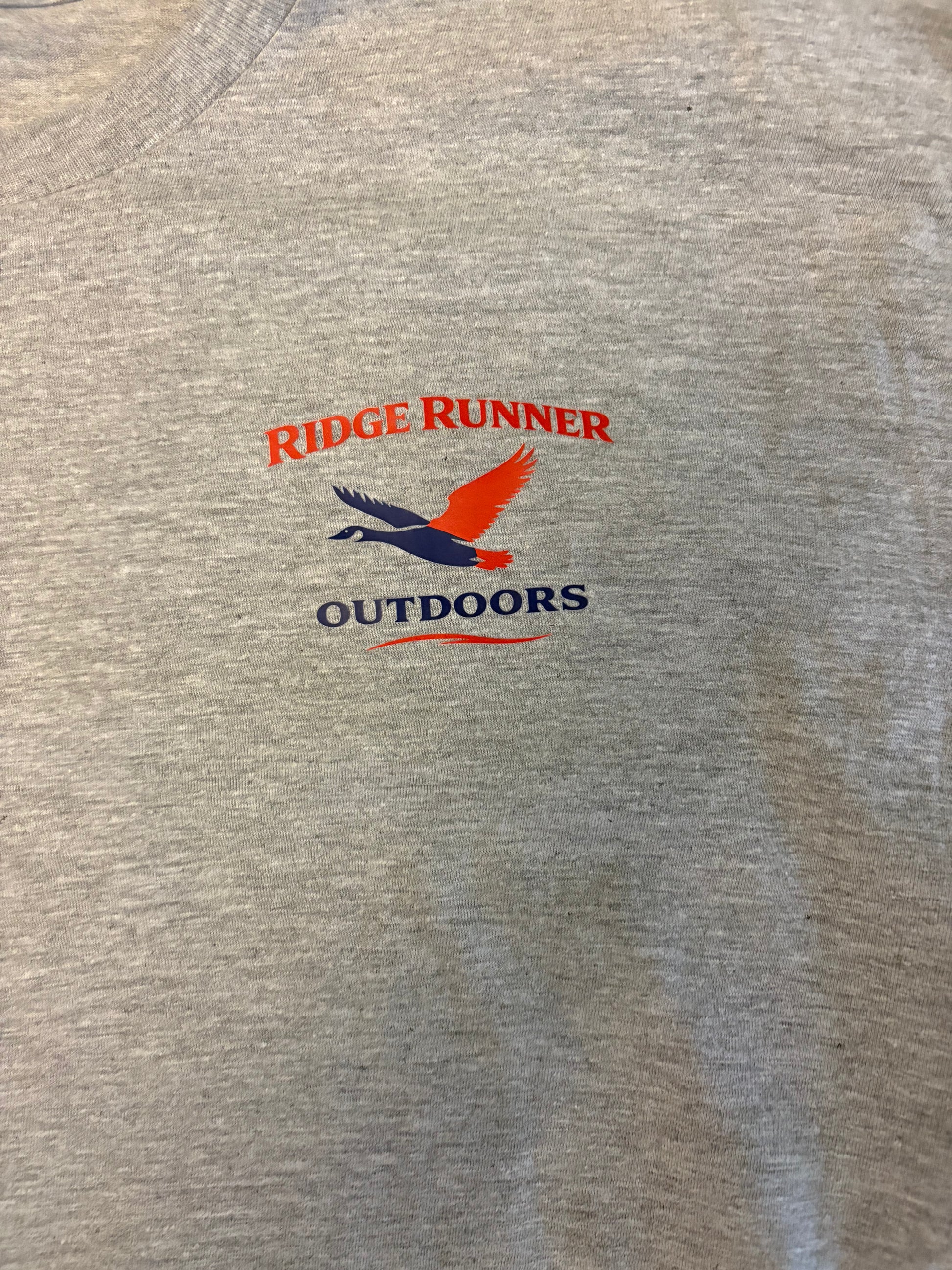 Gray shirt with Ridge Runner Outdoors logo on a plain background